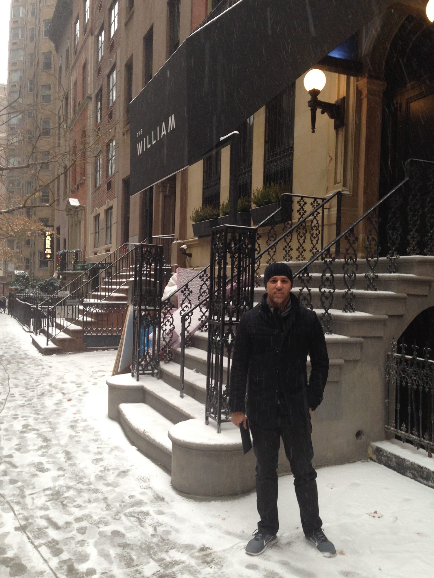 Michael Fuller out front of The William in the snow during the New York opening, December 2013.